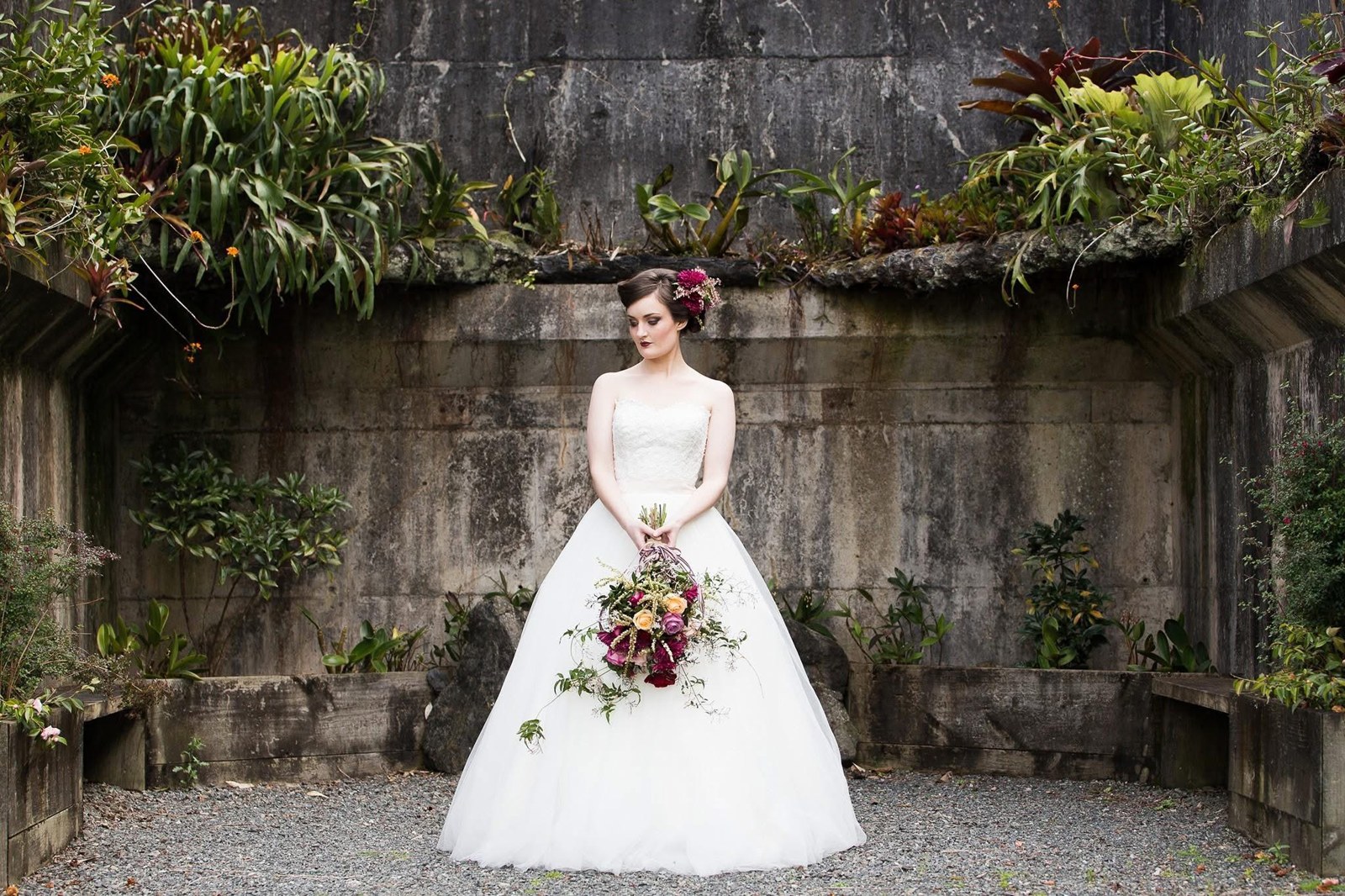 Bride in a white wedding dress holding a bouquet